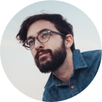 https-www.pexels.comphotoman-wearing-blue-denim-buttons-up-long-sleeve-and-blace-frame-eyelgasses-26939.png